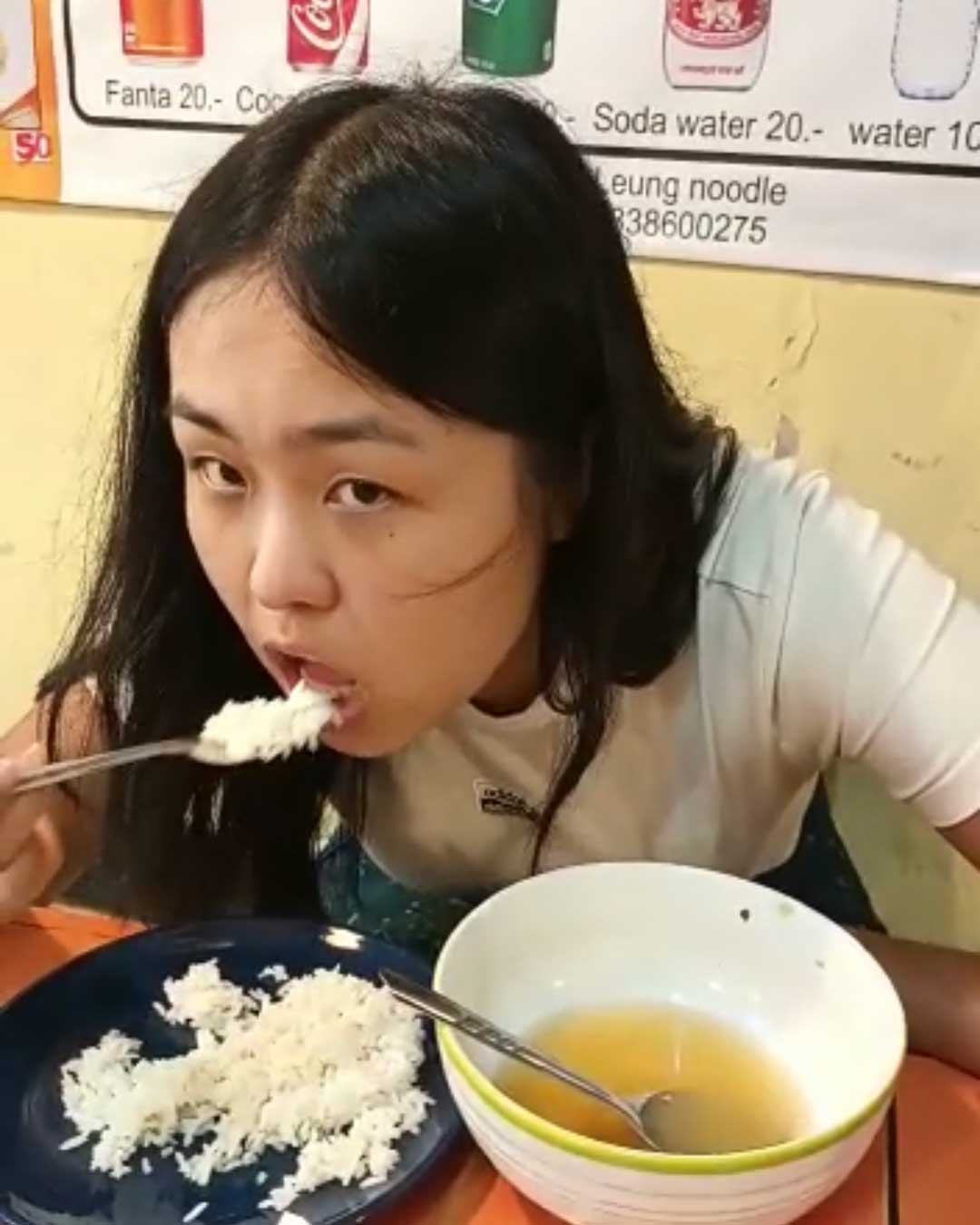 Aurora Zhu eating at a local inn in Chiang Mai