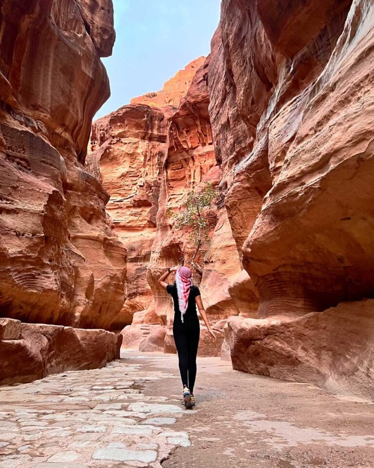 Aurora Zhu walking in the Siq at Petra